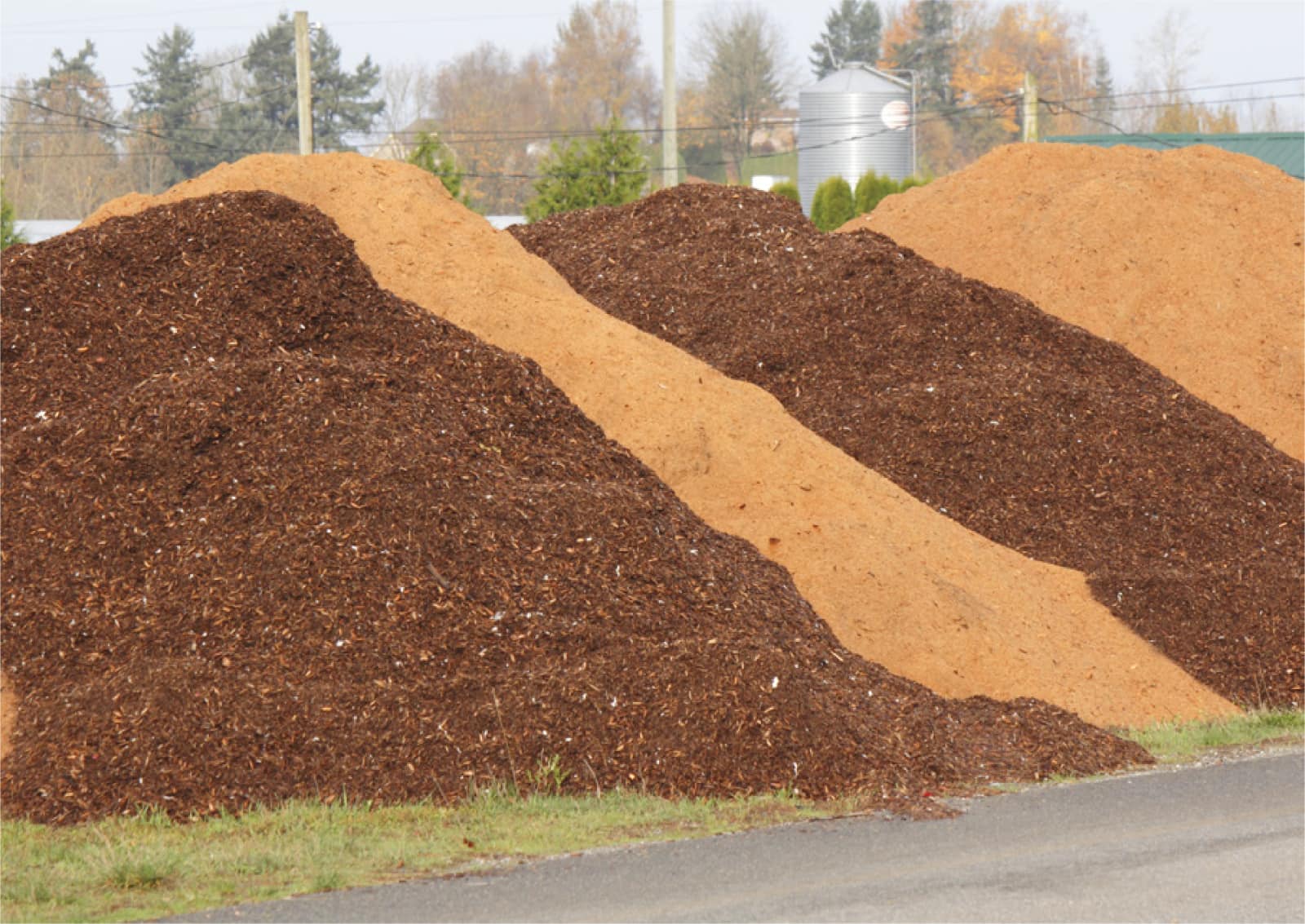 Rows of brown and natural-colored bulk mulch.