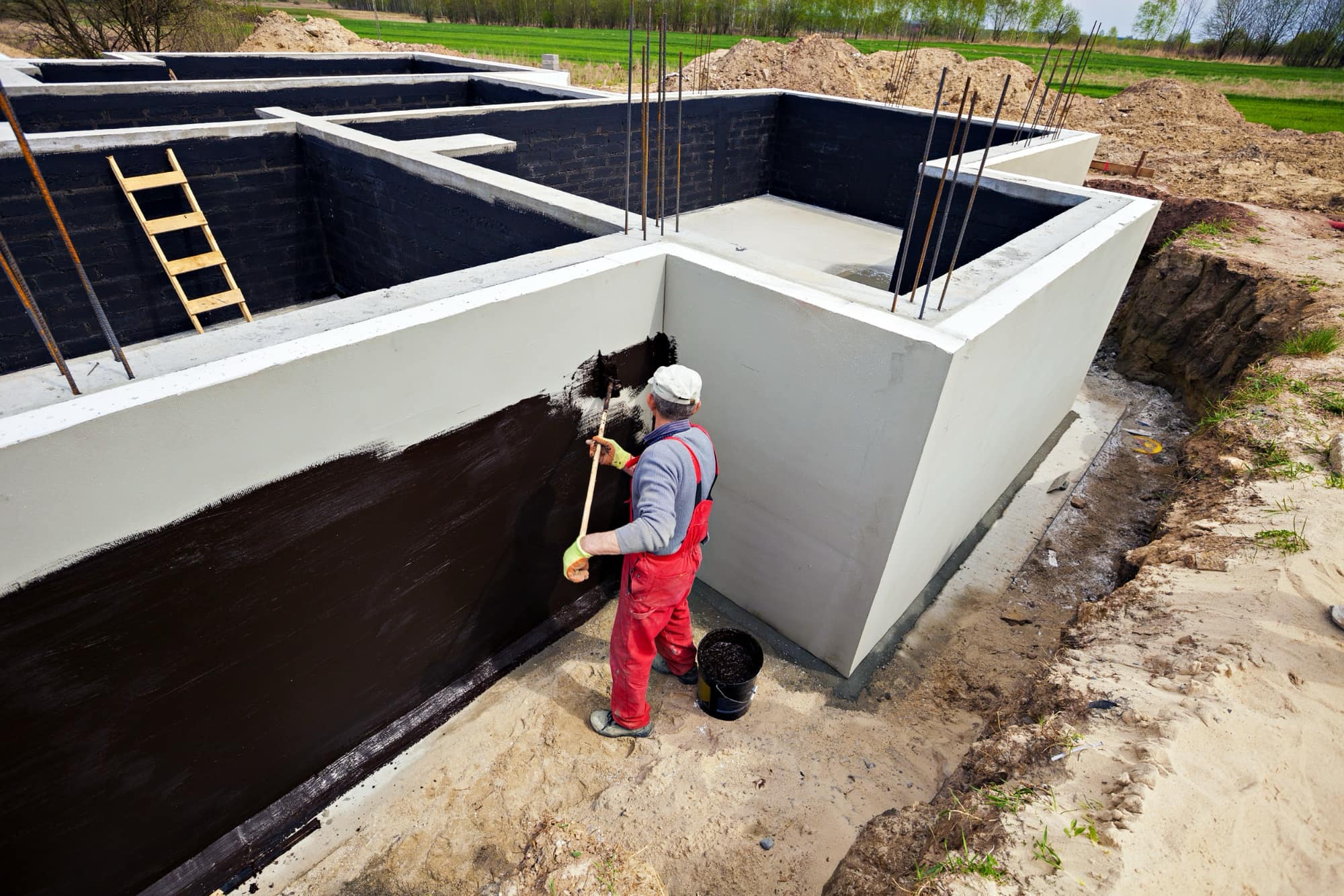 Exterior foundation waterproofing in progress